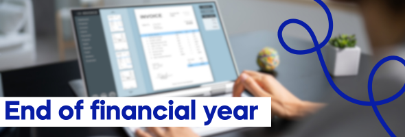 A picture of a laptop screen and text that says End of finanical year